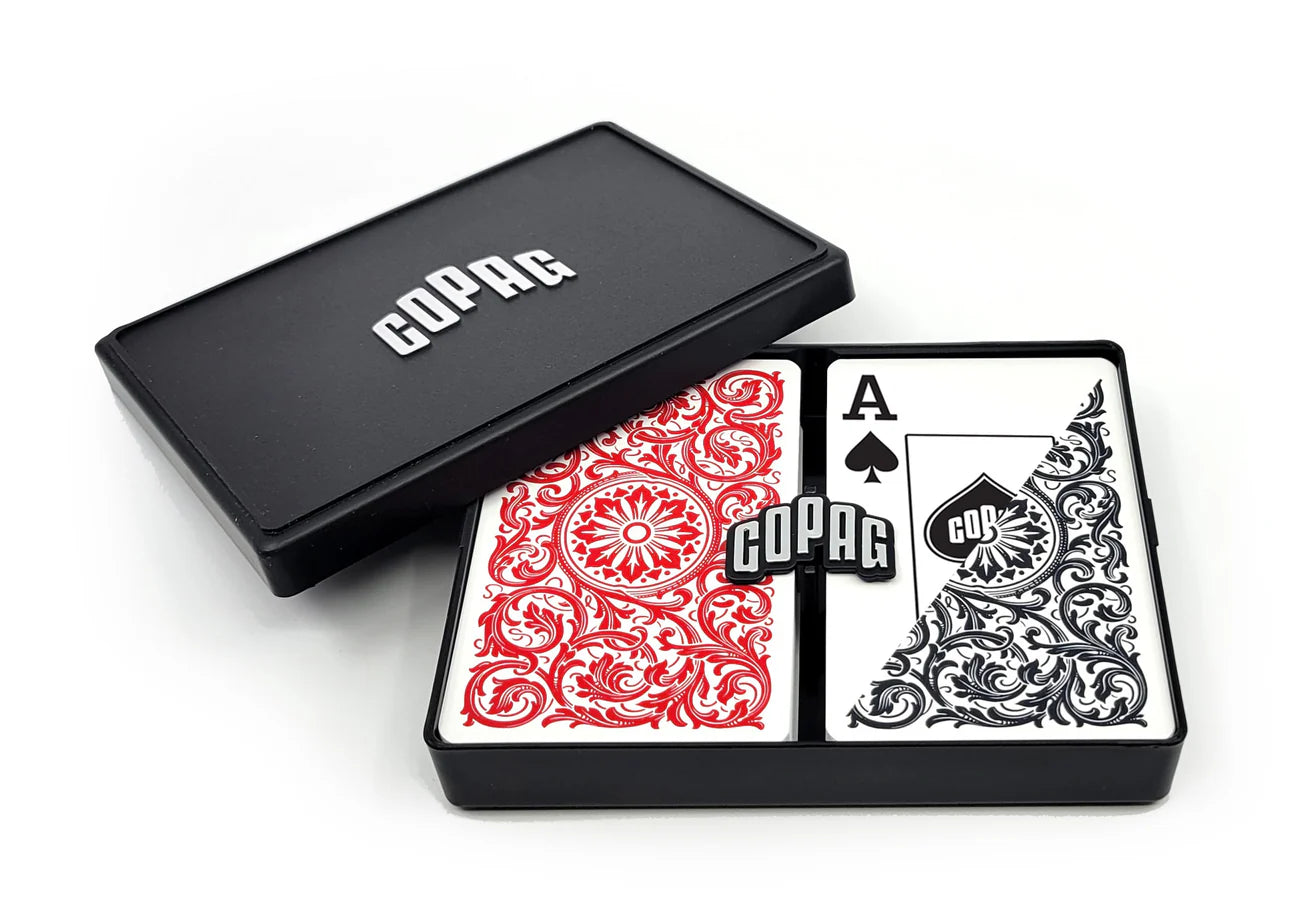 Copag 1546 Bridge Size Jumbo Index (Black & Red) playing cards with a black case on a white background