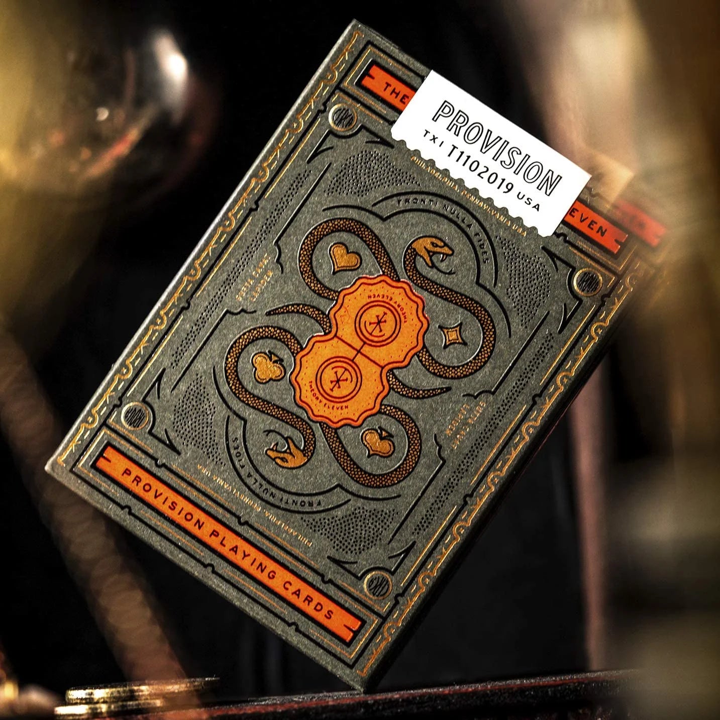 Provision playing cards with intricate design and visible brand label.