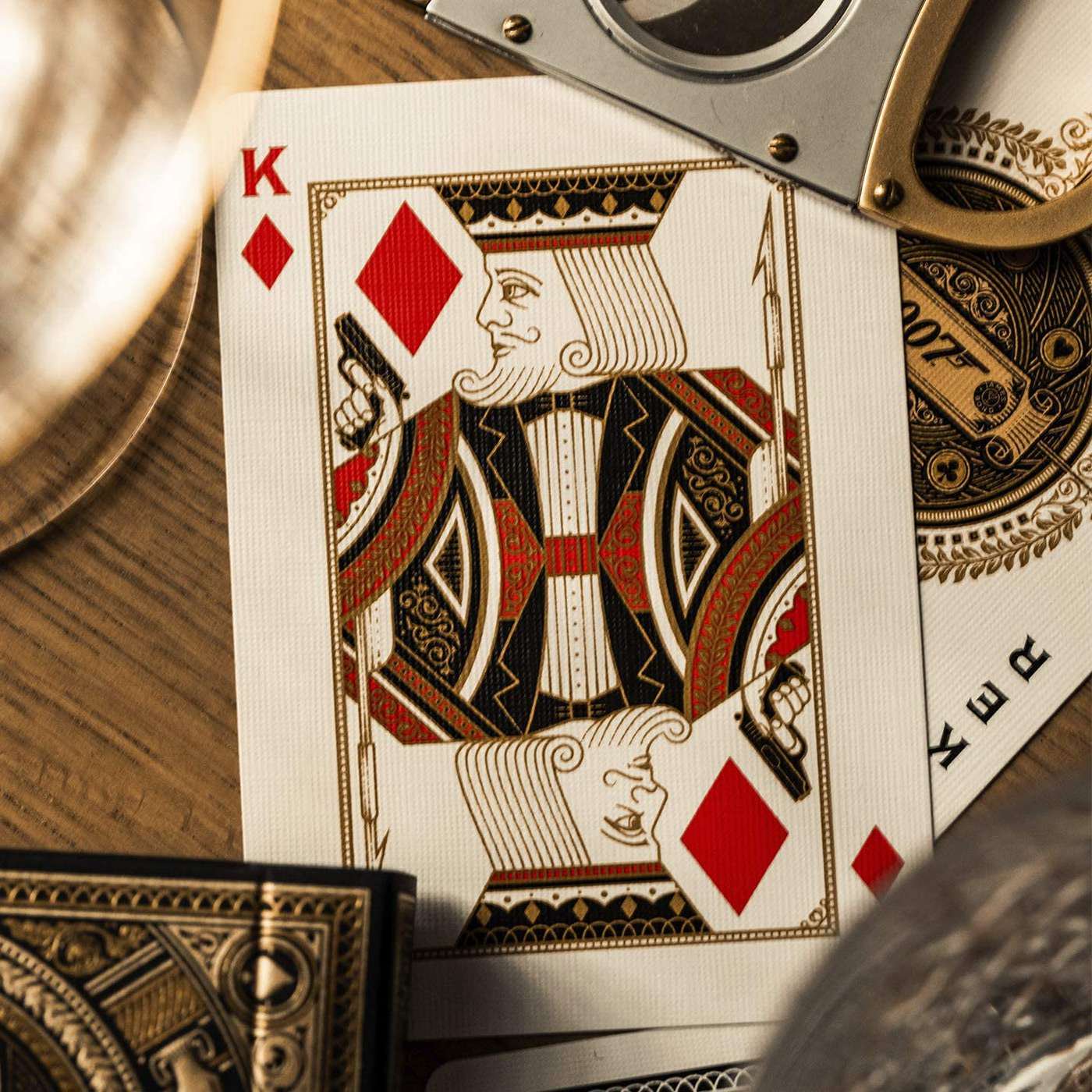 Playing card with a decorative design on a wooden surface