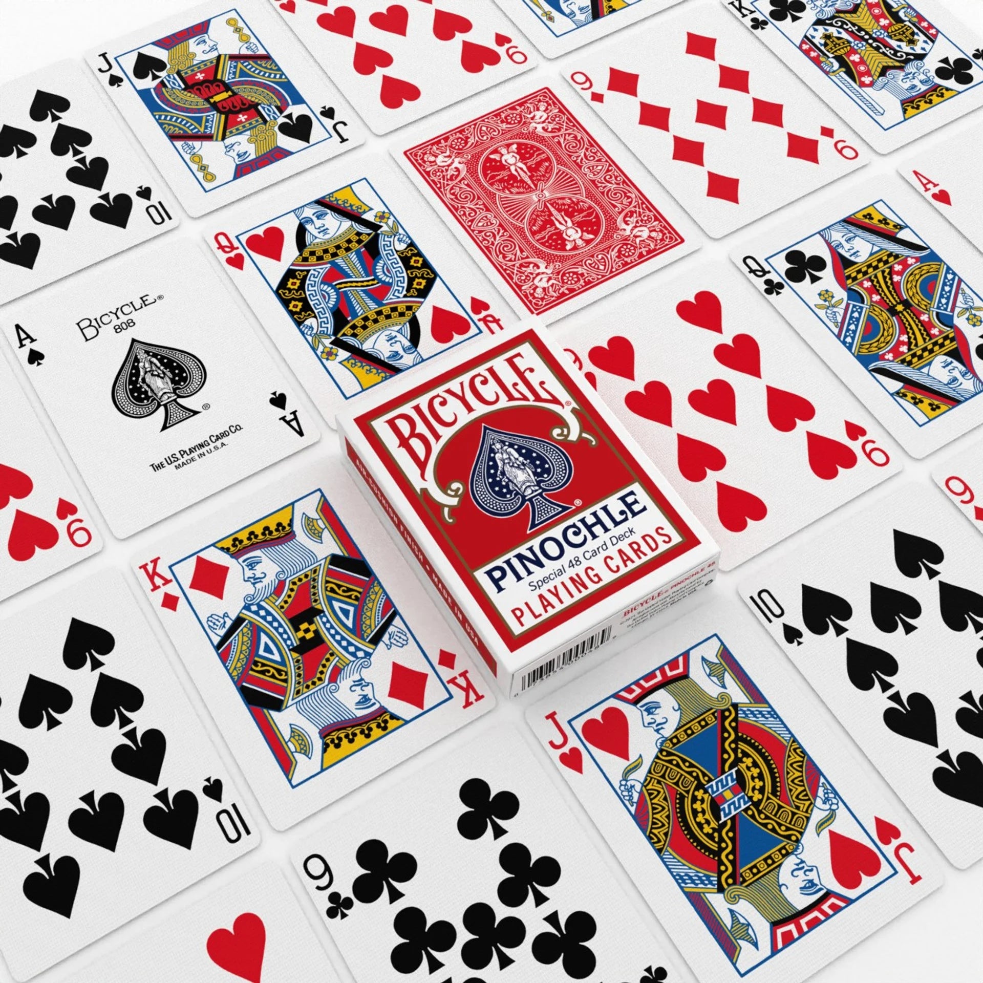 Bicycle Pinochle playing cards with various card suits displayed.