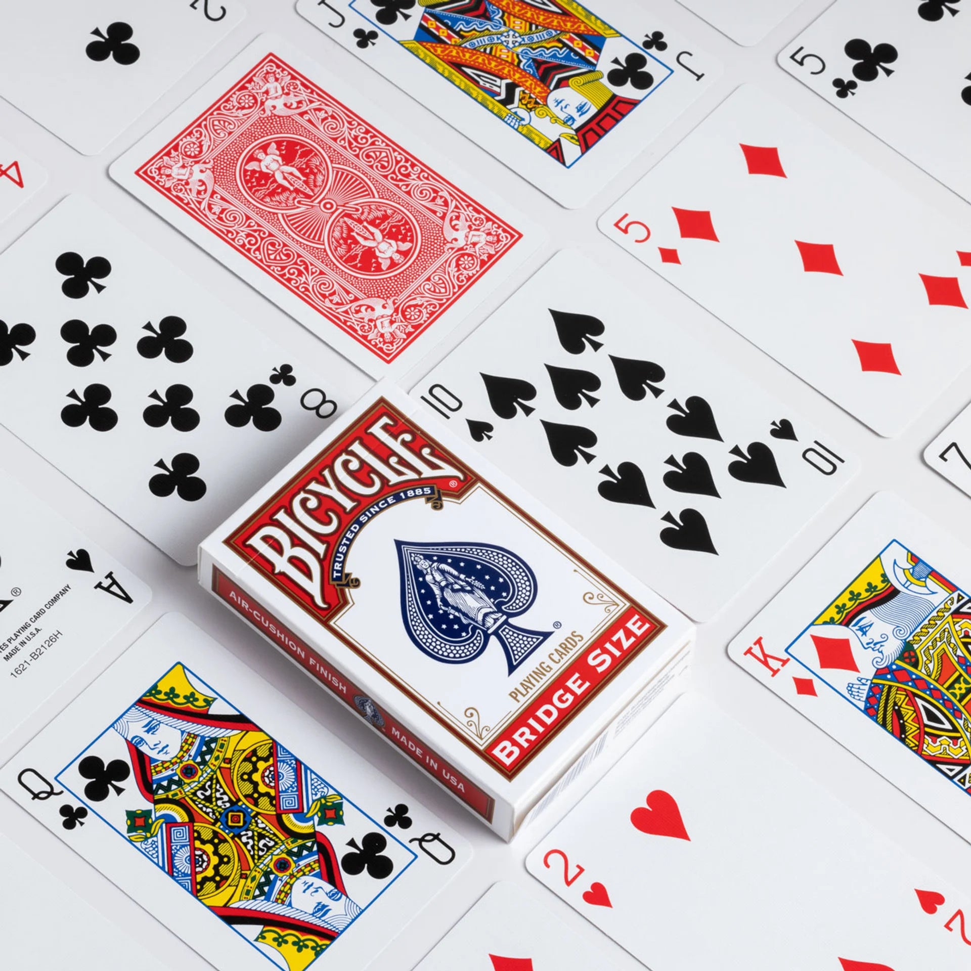 Bicycle Bridge playing cards with various cards displayed on a white surface