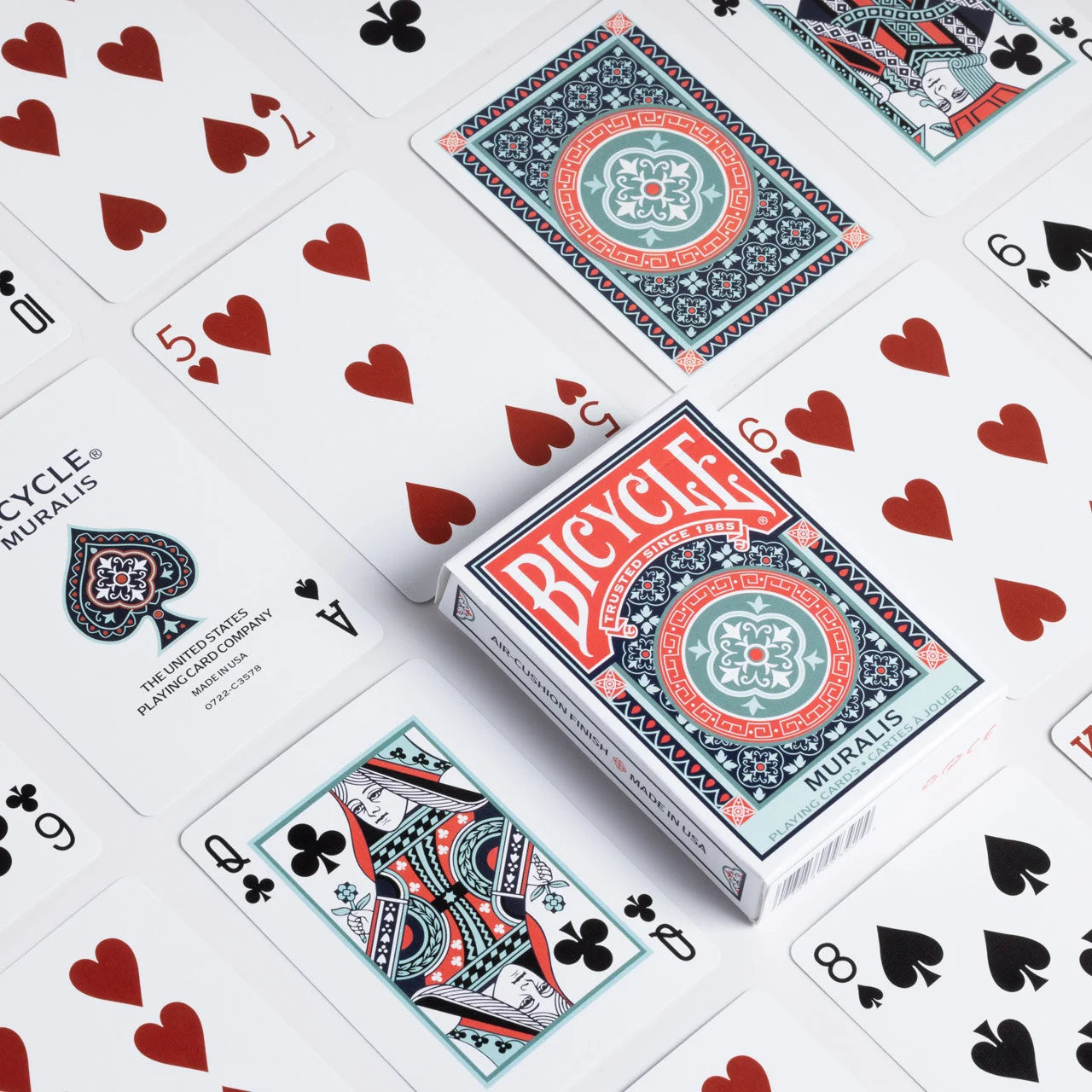 Bicycle Muralist playing cards with card faces showing on a white background