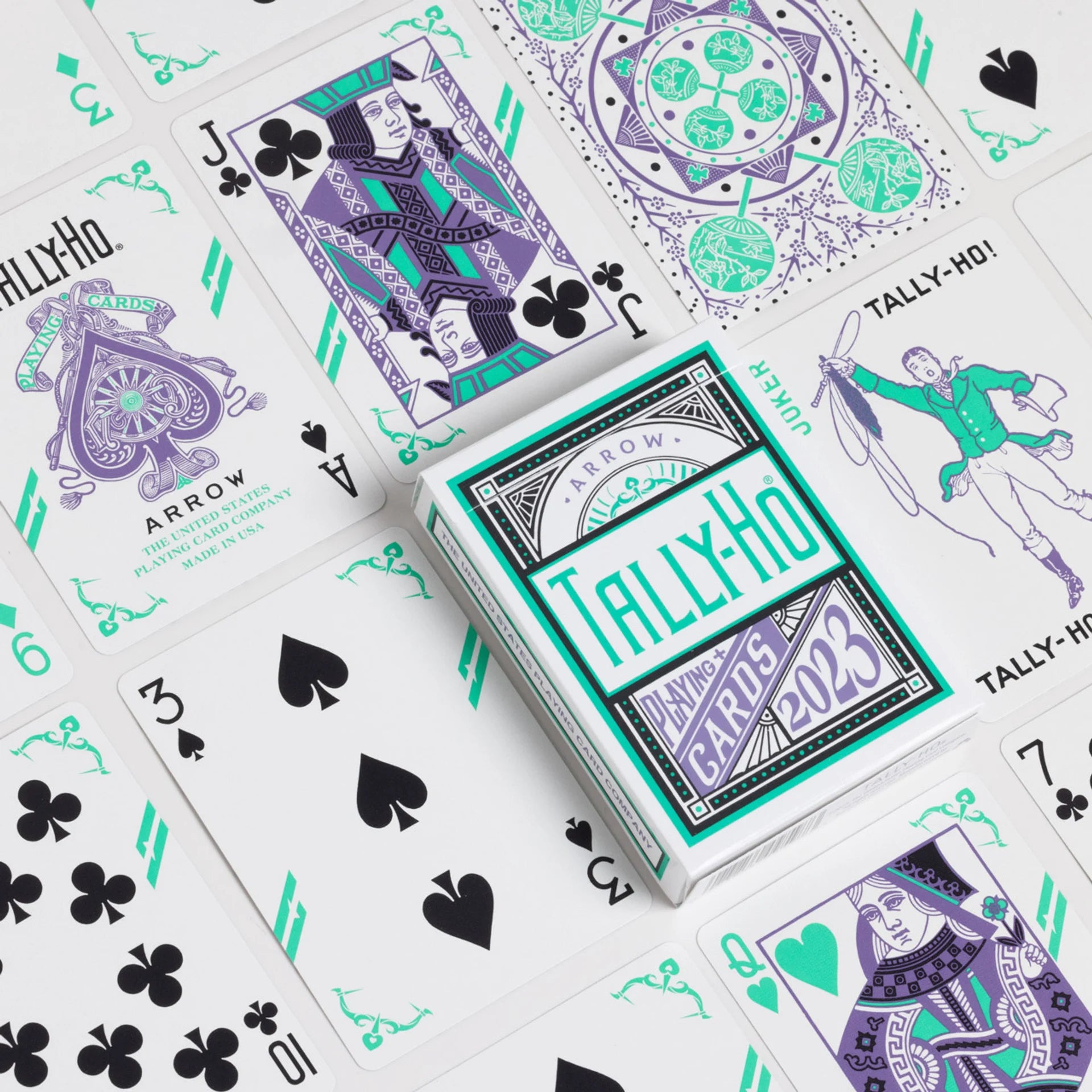 Tally-Ho Arrow playing cards with a teal and purple design on a white background
