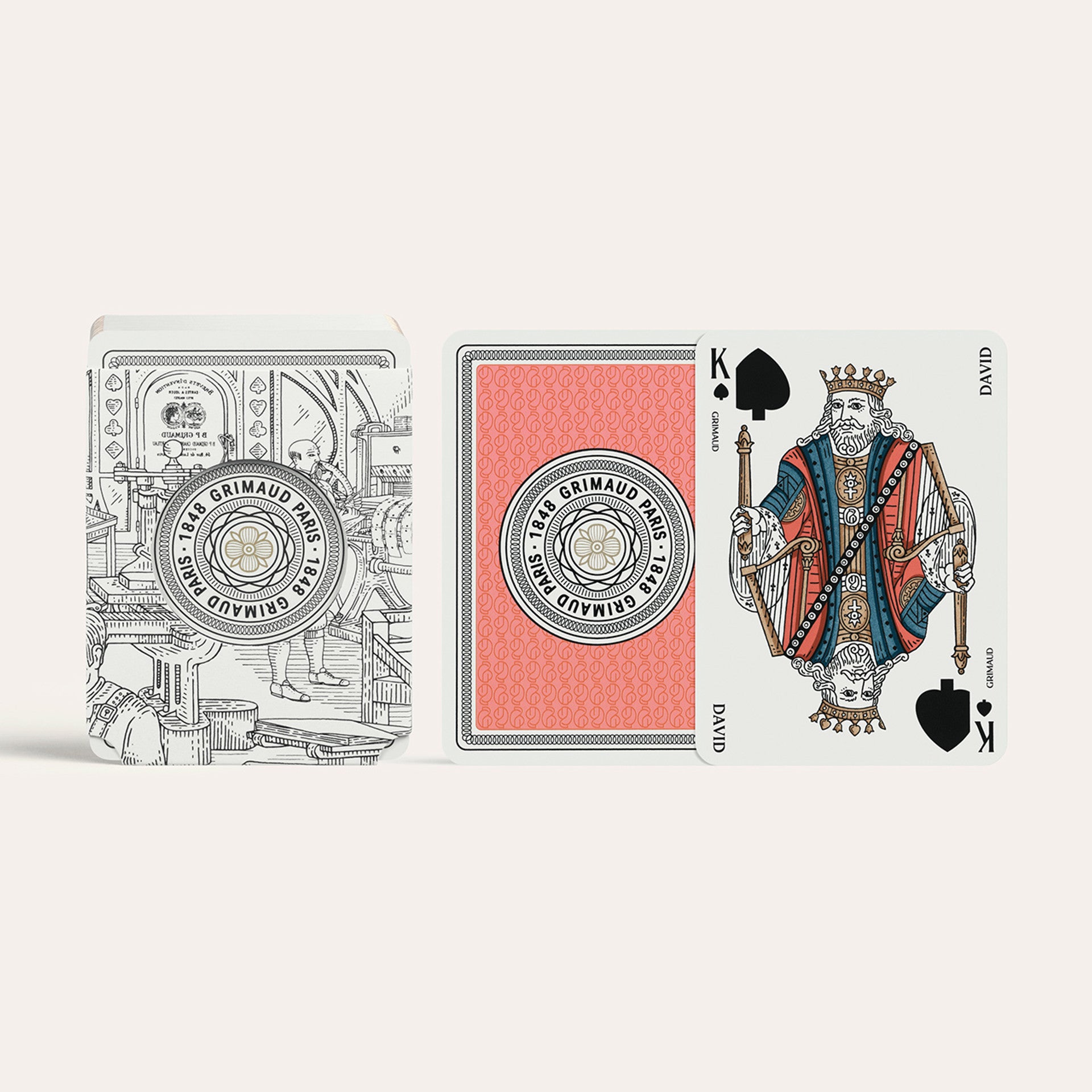 Playing cards with a King of Spades design on a white background