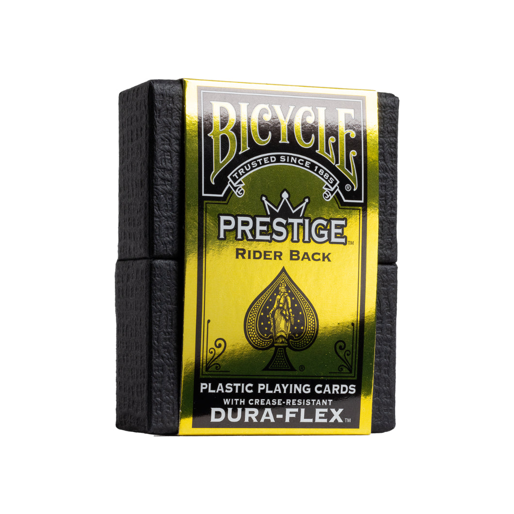 Bicycle Prestige playing card box with yellow and black design on a white background