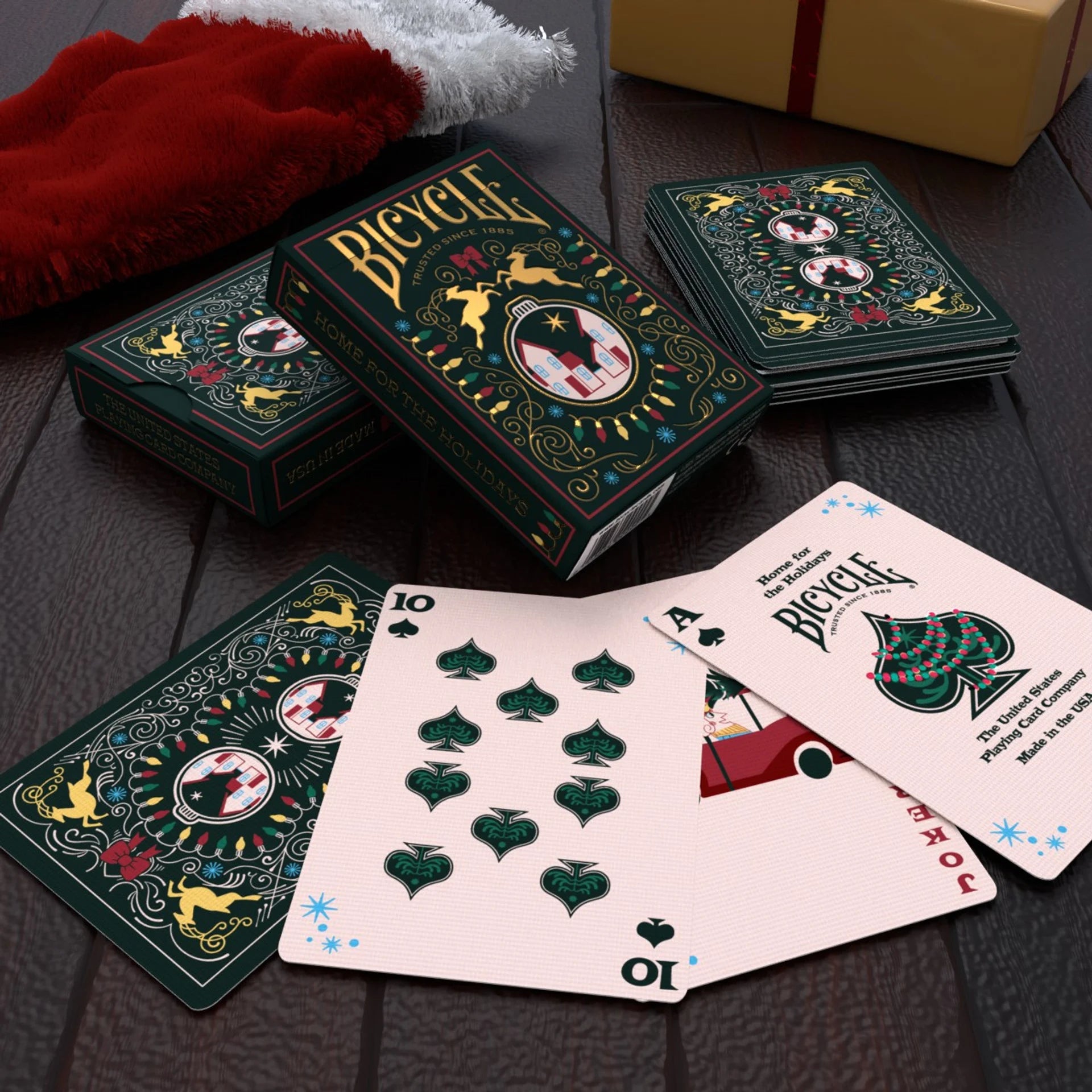 Bicycle playing cards with decorative design on a dark surface