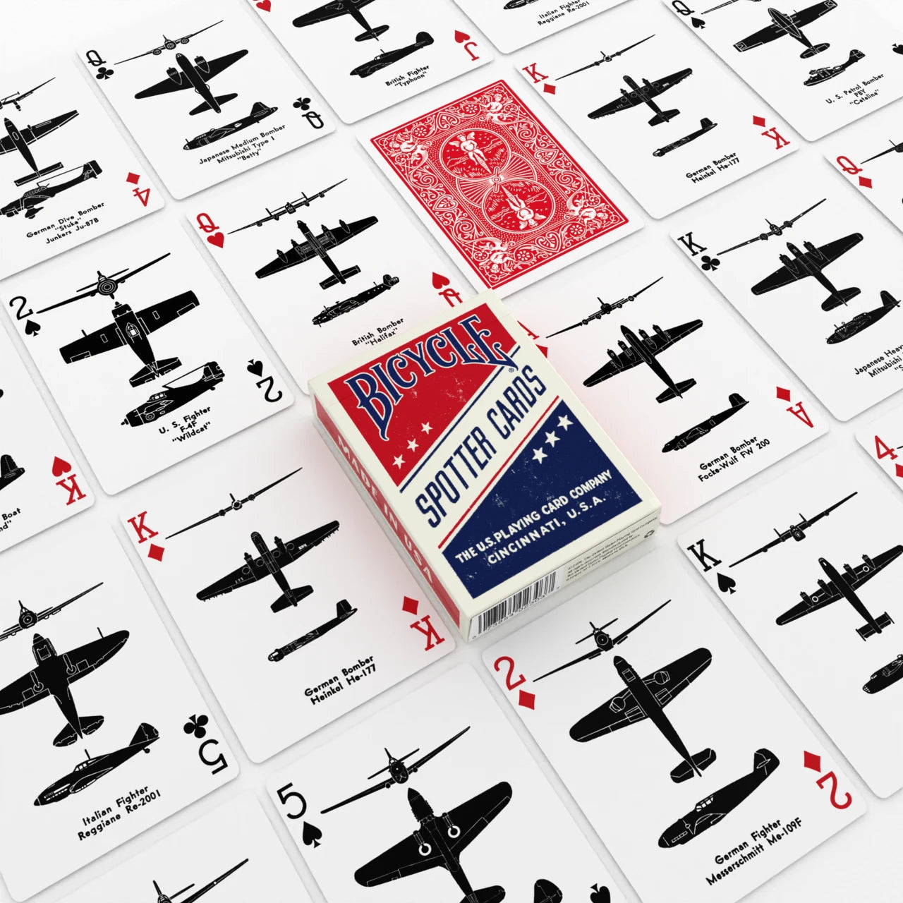 Bicycle Spotter Red playing cards spread with red Rider Back card and WWII aircraft silhouettes