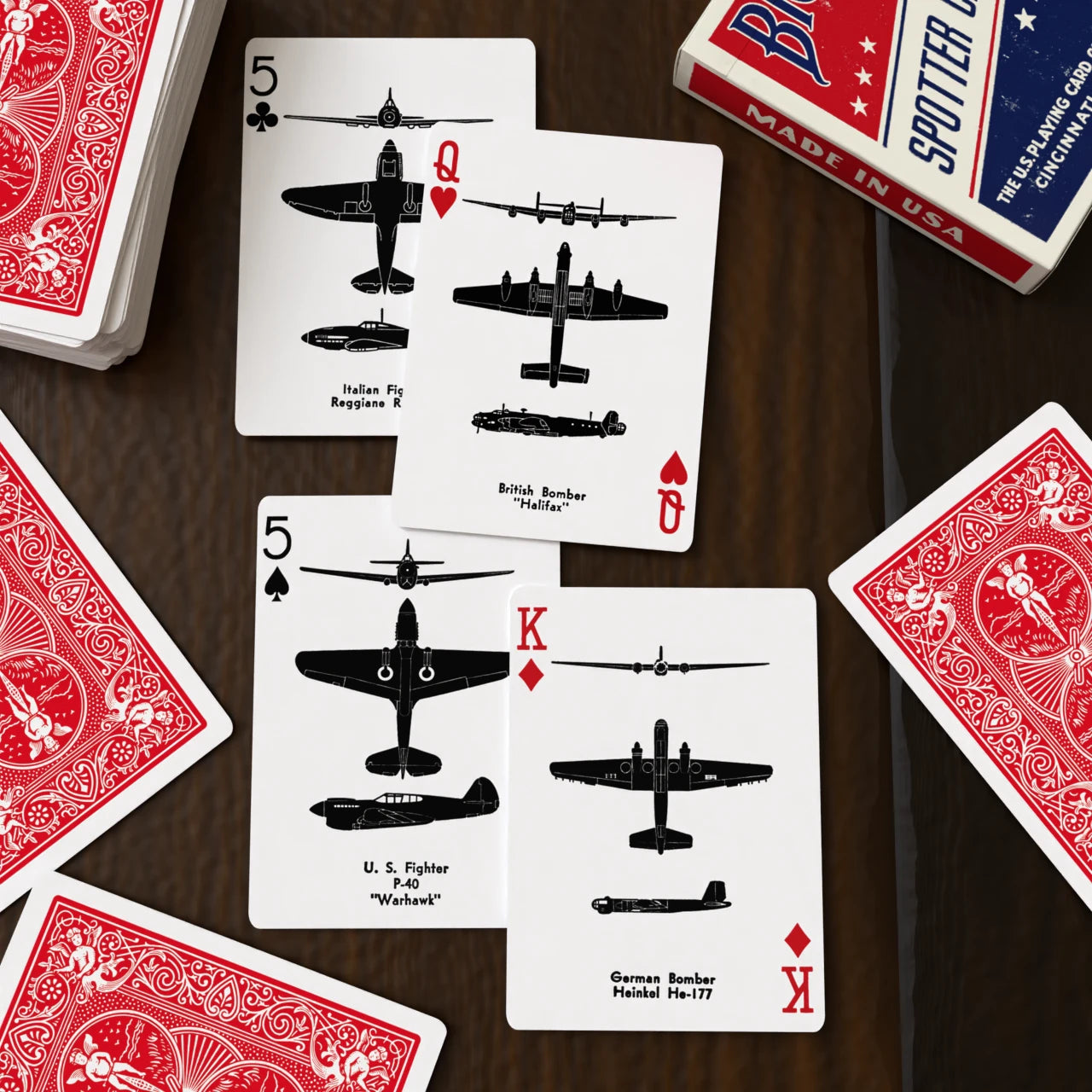 Bicycle Spotter Red playing cards showing British Halifax, U.S. P-40 Warhawk, and German Heinkel He-177 aircraft silhouette cards