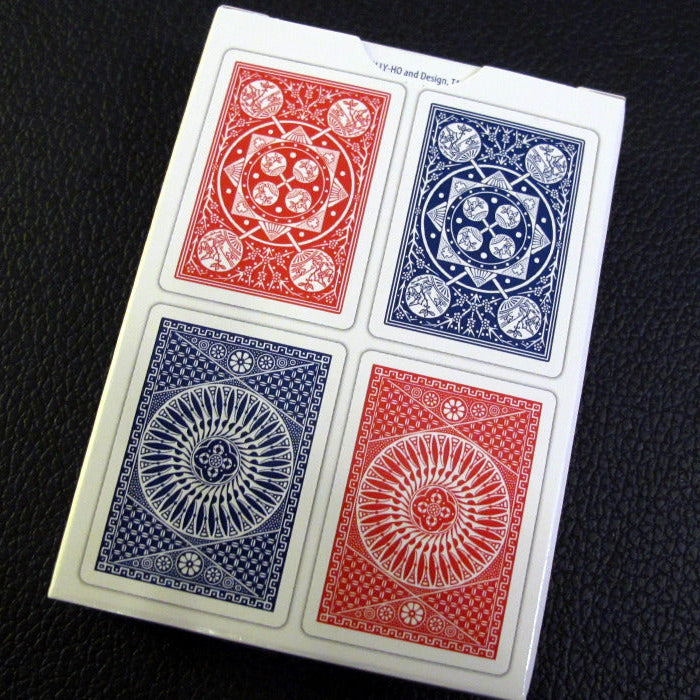 Set of red and blue playing cards on a black background