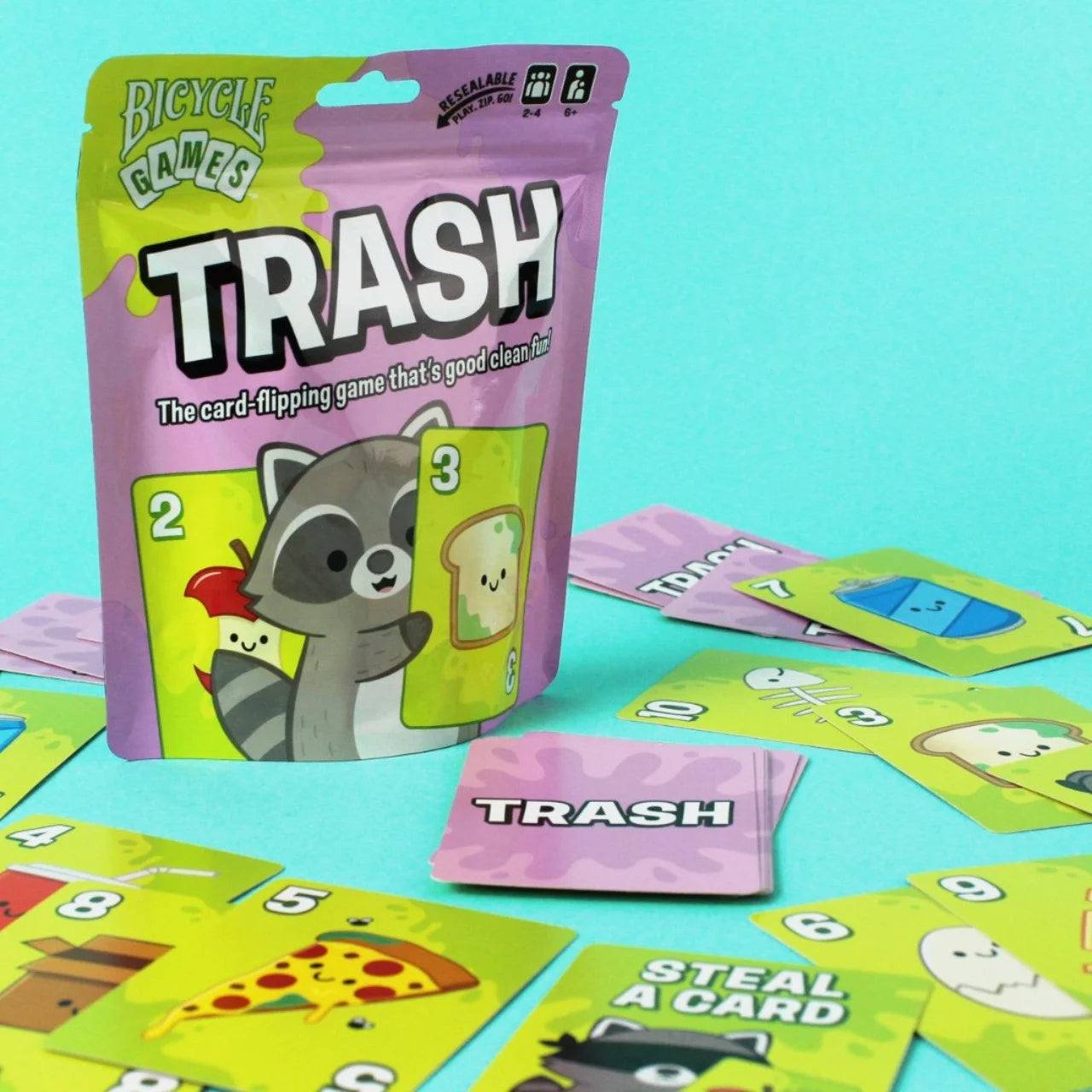 Bicycle Trash card game pouch surrounded by numbered and action cards