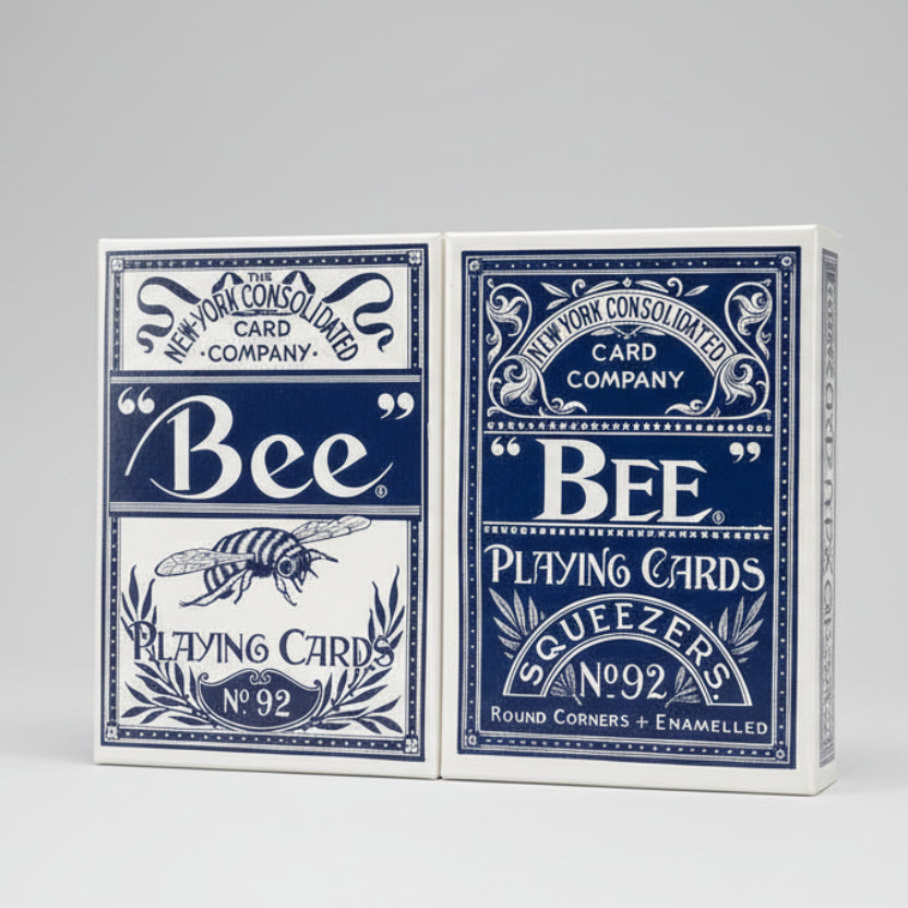 Two blue and white Bee Squeezers playing card boxes from The New York Consolidated Card Company.