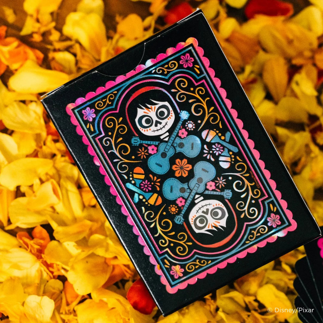 Bicycle Disney Coco custom playing cards with black background and bright accents