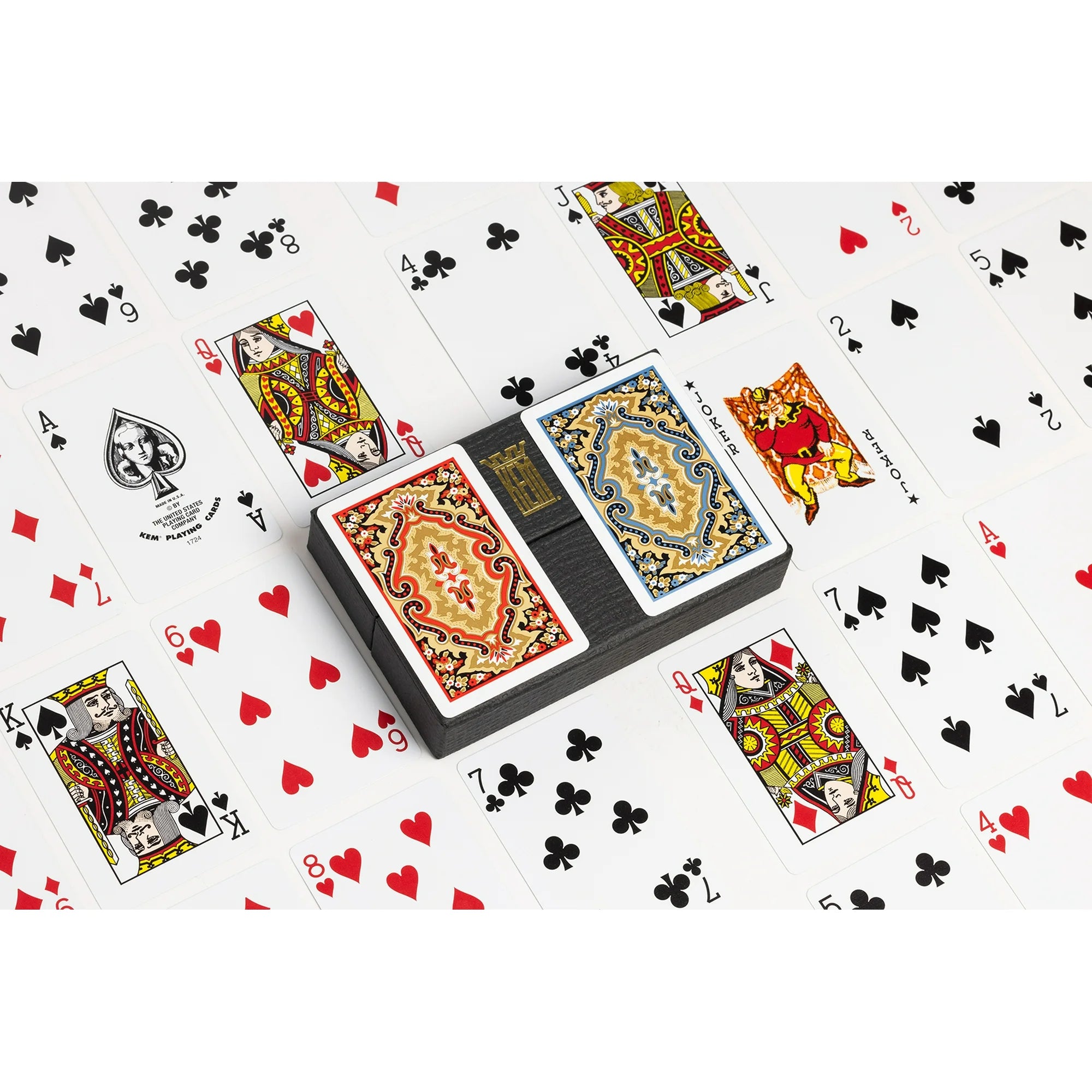KEM Playing cards with decorative design on a white background