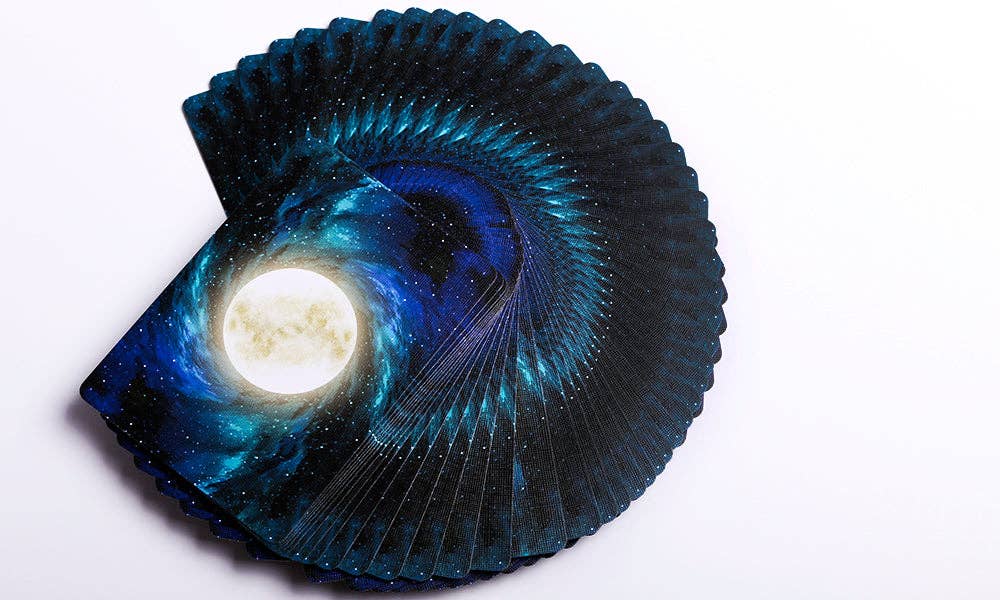 Decorative shell with a galaxy design on a white background