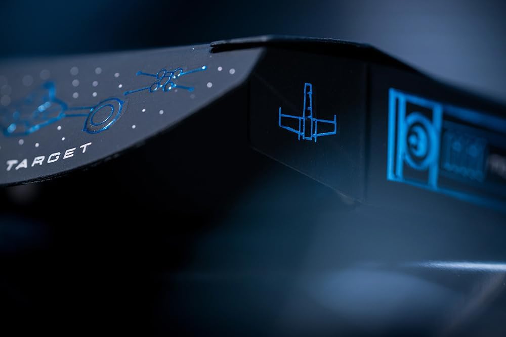 Close-up of a futuristic device with blue illuminated text and symbols on a dark background