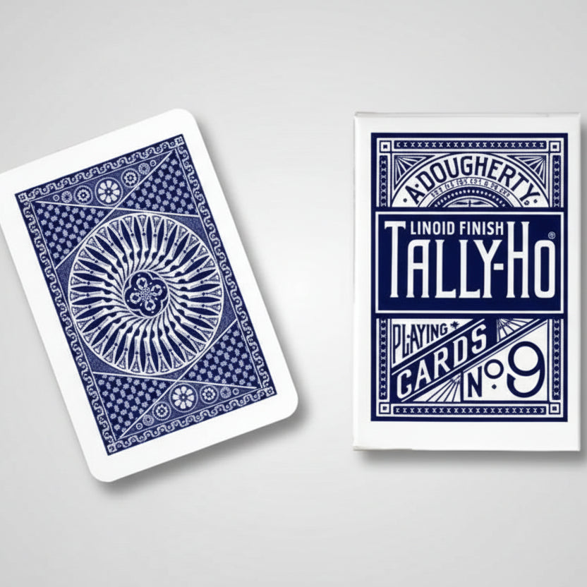 Two blue Tally-Ho playing card decks on a white background