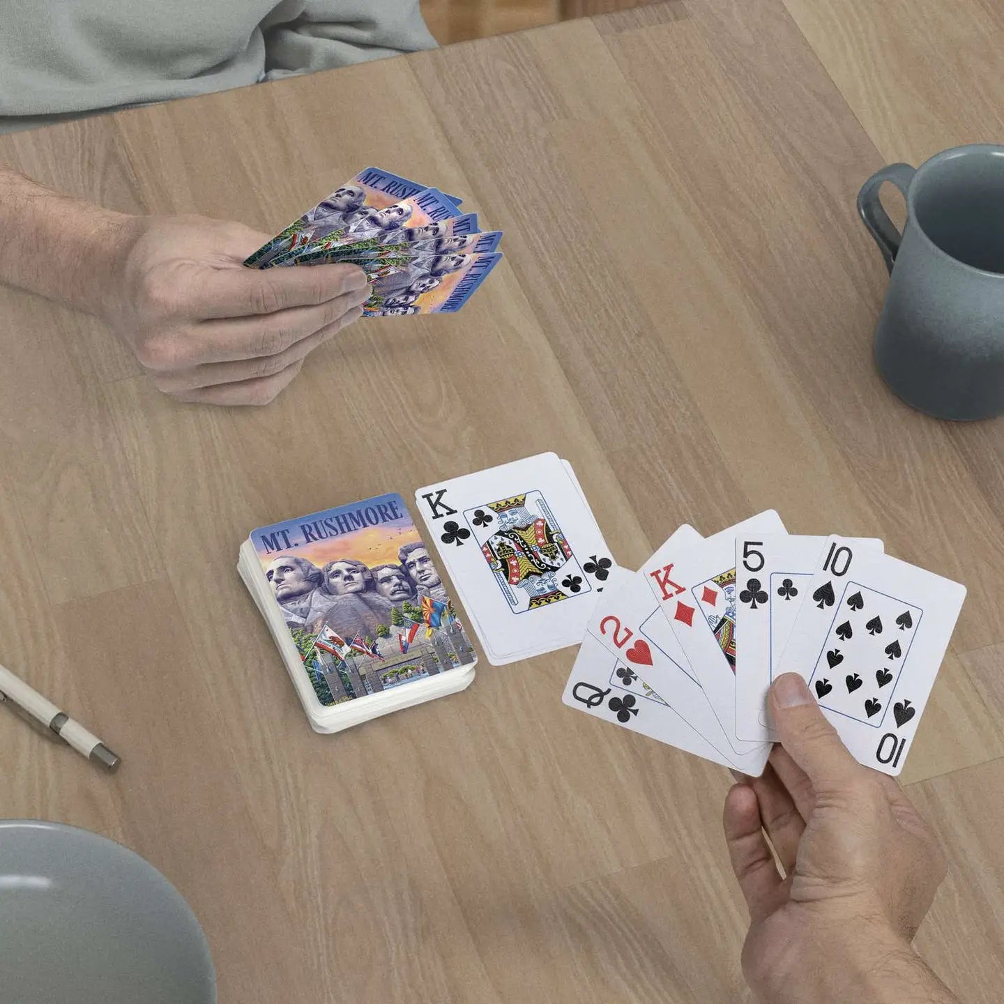 Mount Rushmore jumbo-index playing cards in use at a table