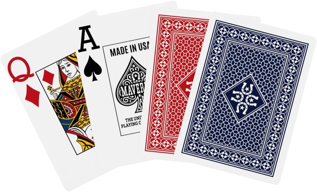 Four playing cards from Maverick Made in USA Jumbo deck with visible branding on a white background