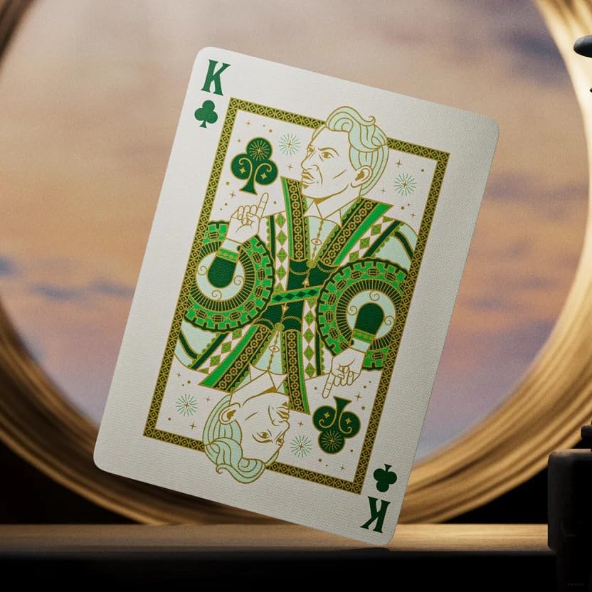 King of Clubs playing card with decorative green design on a blurred background