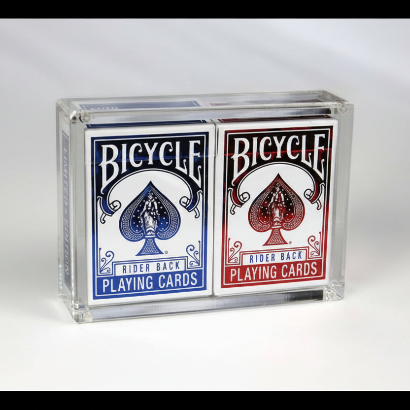Front view of acrylic case containing red and blue Bicycle Rider Back mini decks against white background.