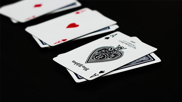 Blue Ribbon playing cards on a black background