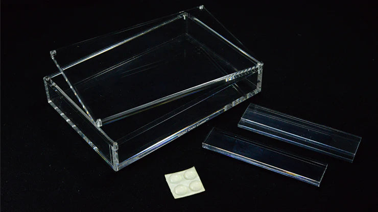 Clear acrylic tray with additional clear acrylic pieces on a black background