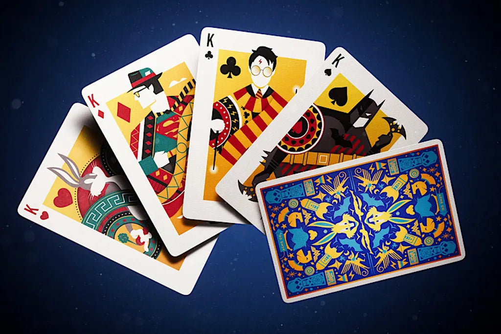 Colorful playing cards with unique designs on a dark blue background