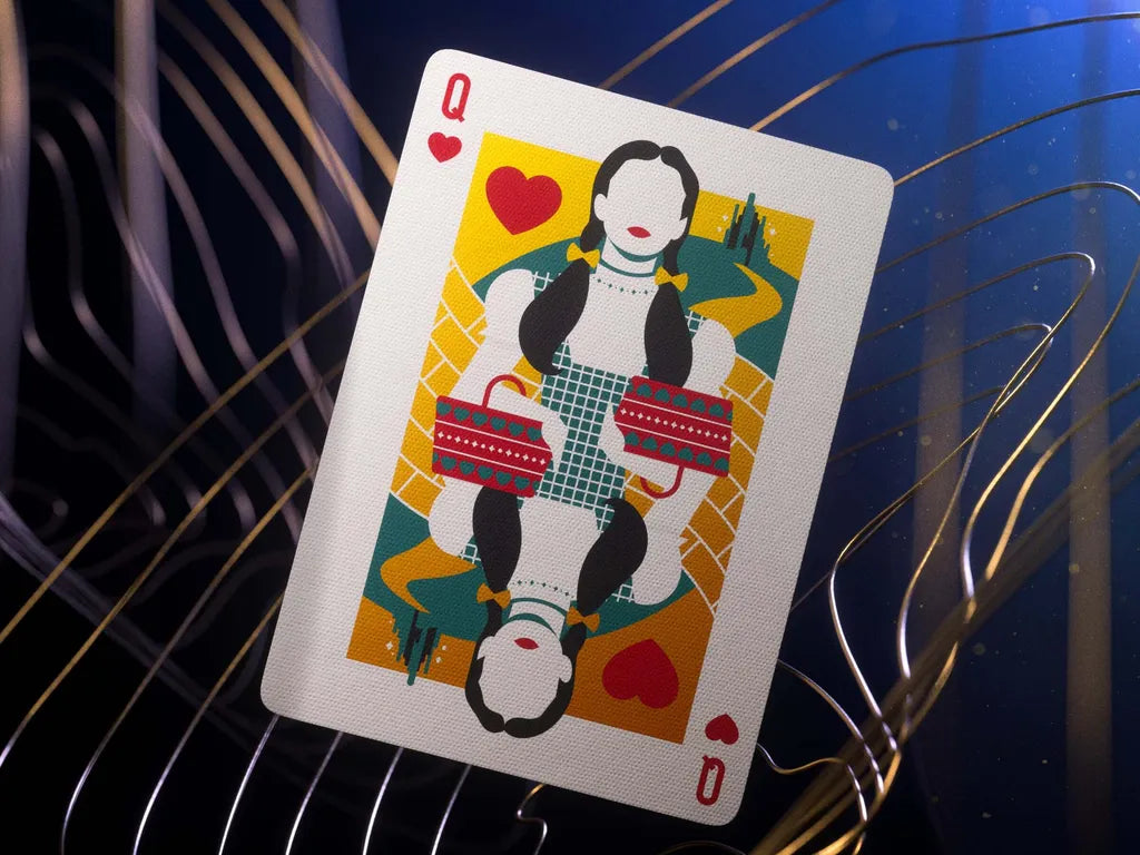 Playing card featuring a stylized illustration of a woman with hearts on a dark background