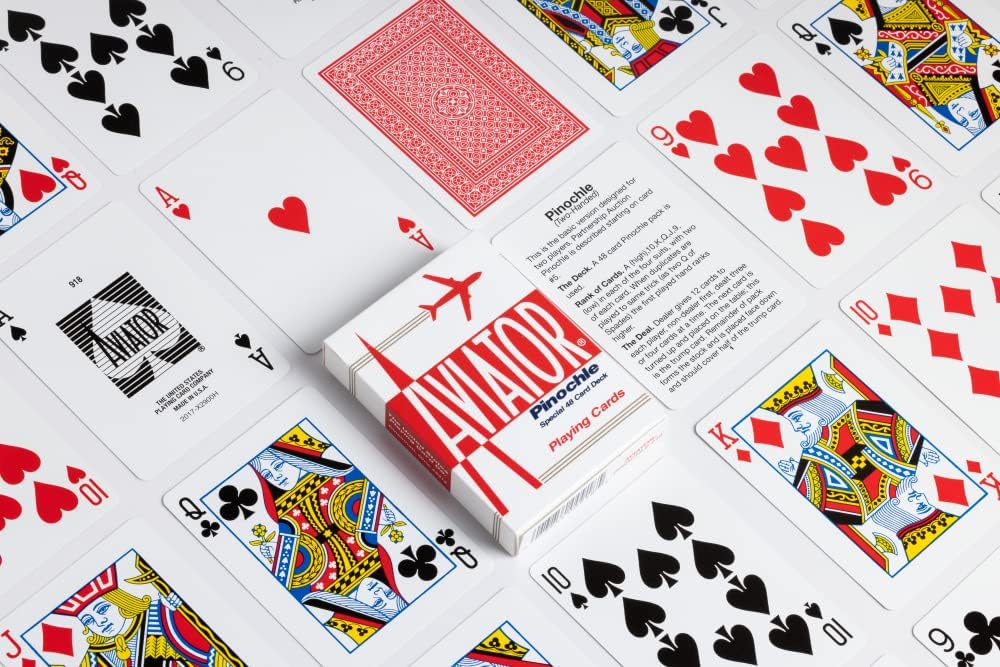 Pinochle playing cards with a focus on the 'Aviator' brand packaging.