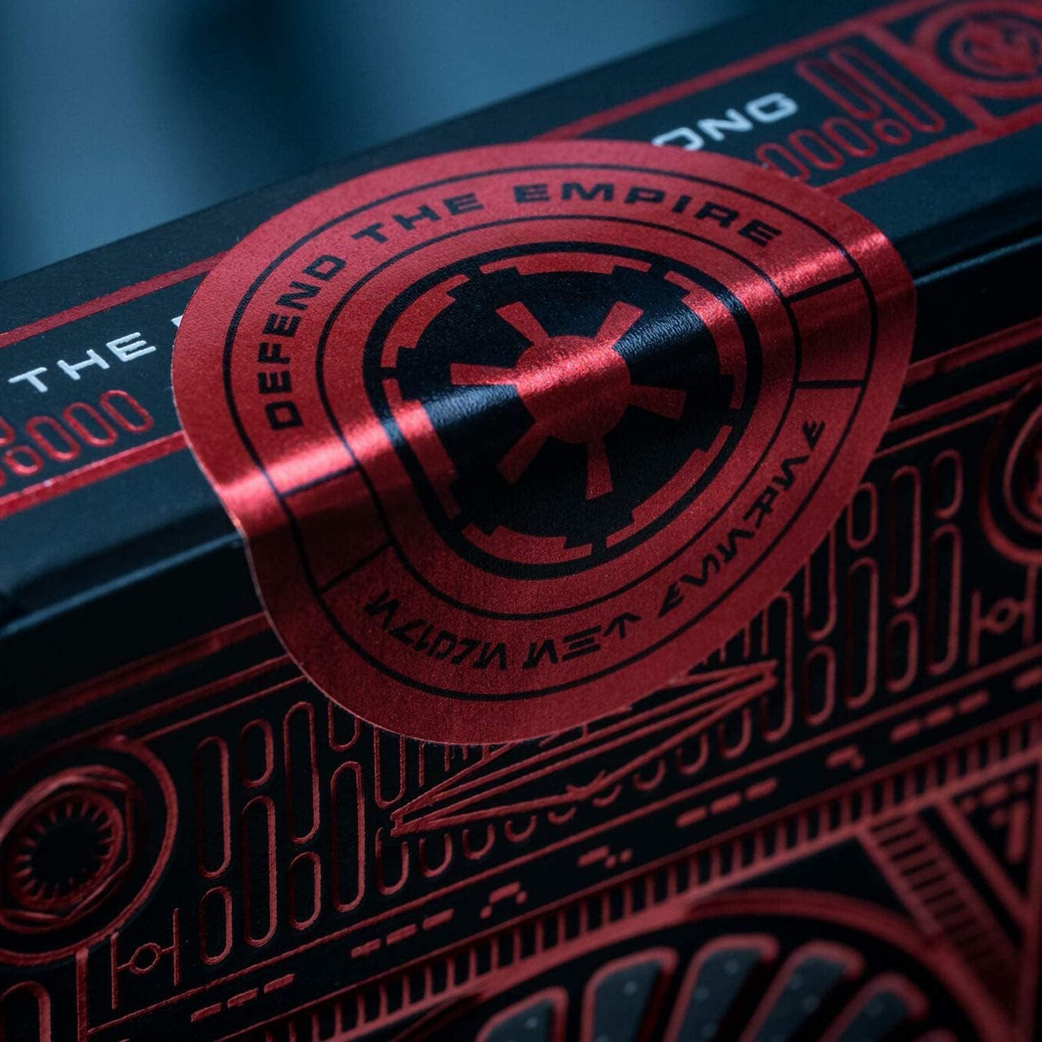 Close-up of a product with 'Defend the Empire' text and design elements.