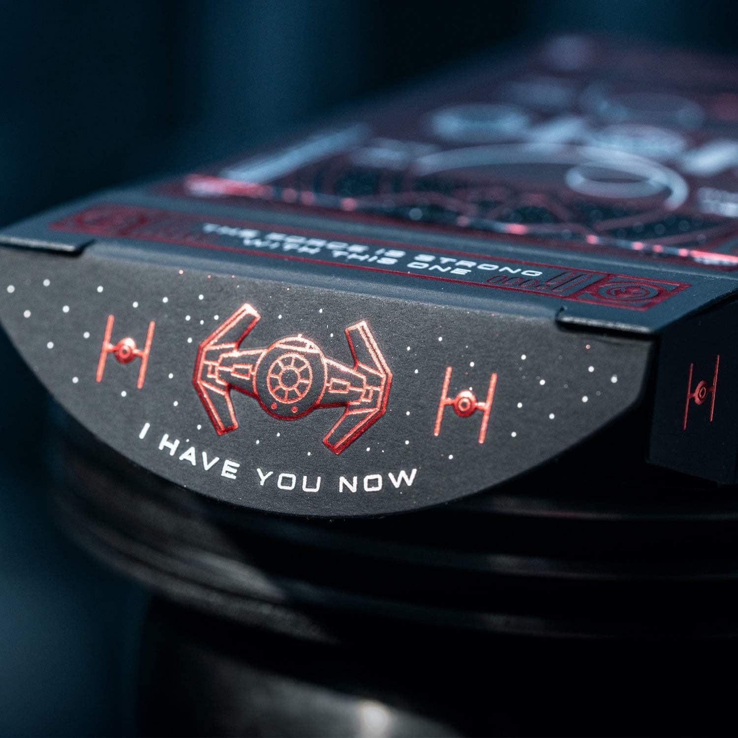 Close-up of a gaming console with Star Wars design elements on a dark background