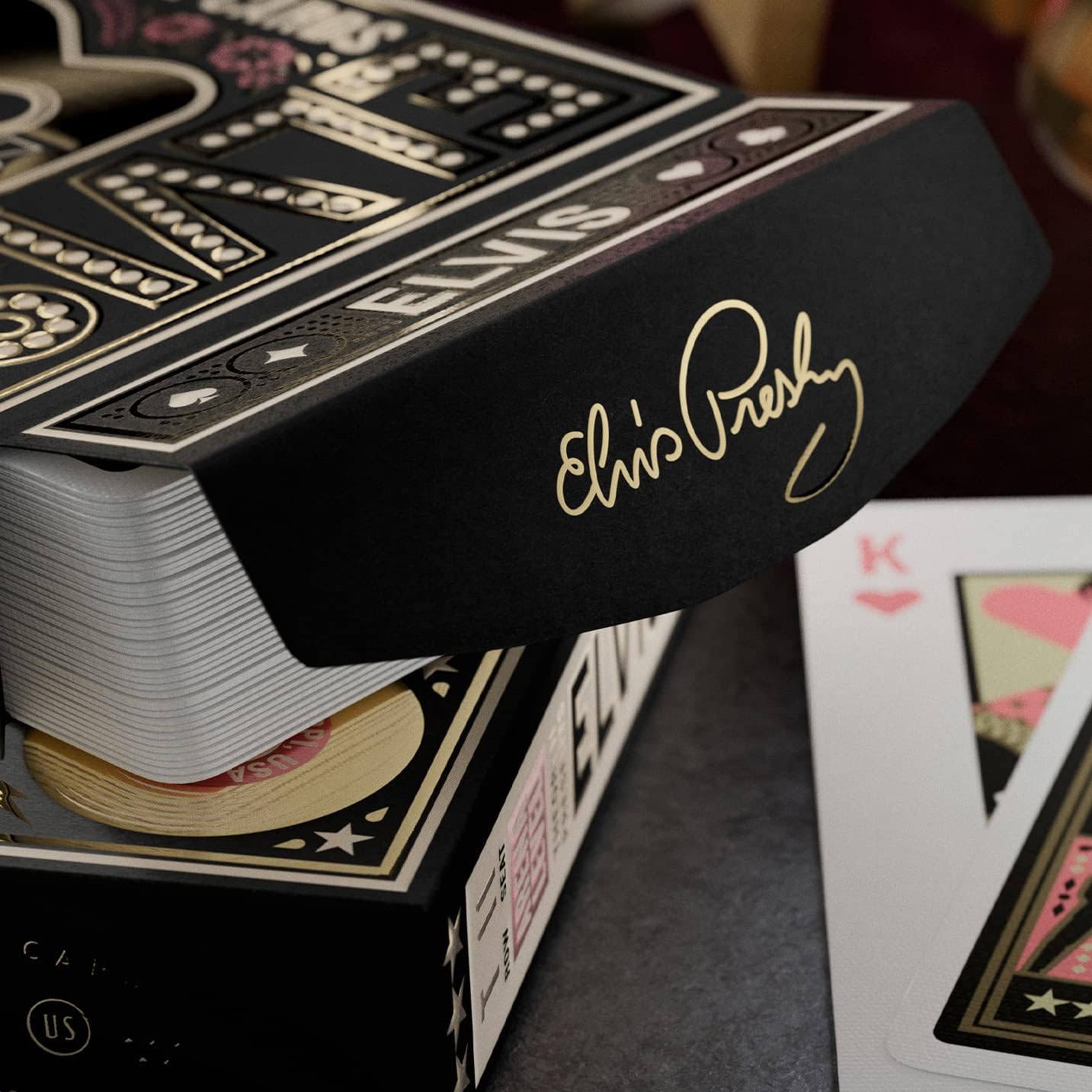Close-up of Elvis Presley signature printed in gold on inside flap of Theory11 Elvis tuck.