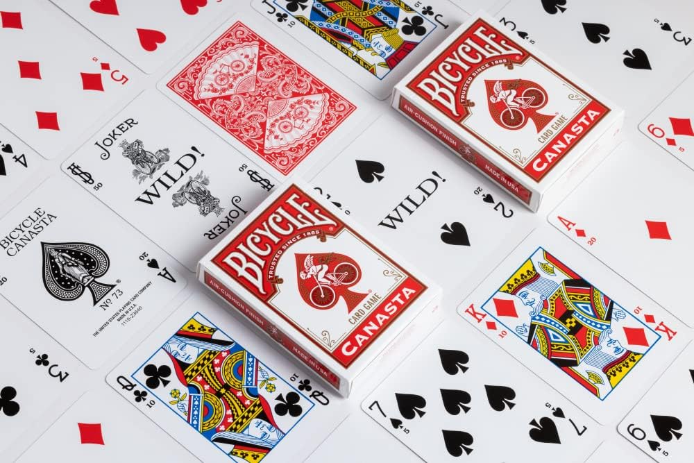 Bicycle Canasta playing cards with various cards displayed on a white background