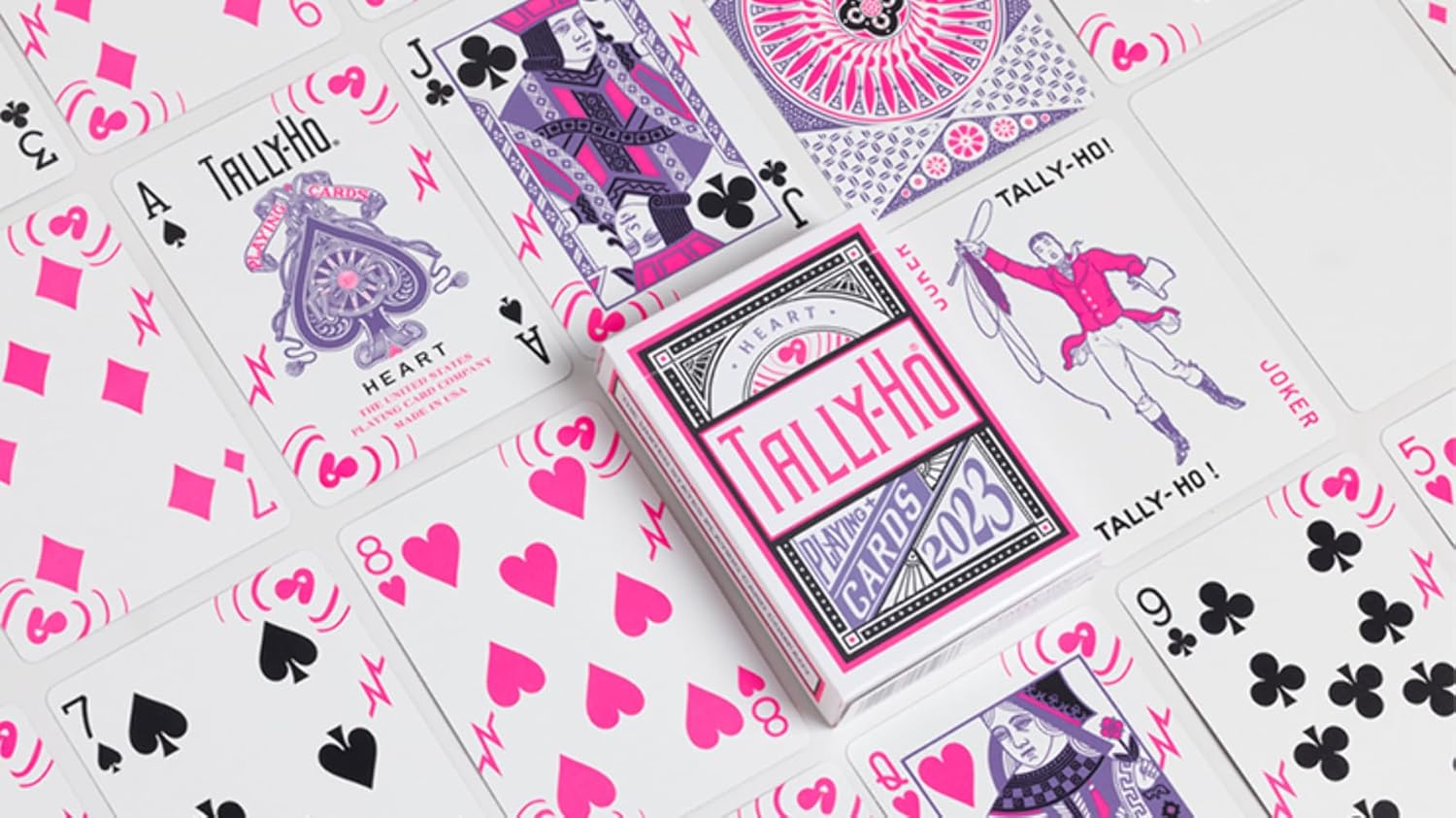 Tally-Ho Heart playing cards with pink and purple designs on a white background