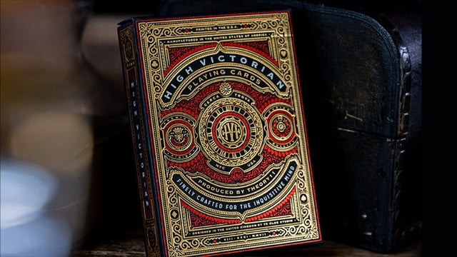 High Victorian Playing Cards with ornate gold and red design on a dark background