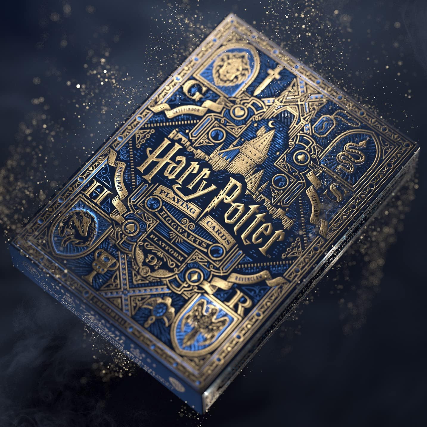 Harry Potter playing cards with decorative blue and gold design on a dark background