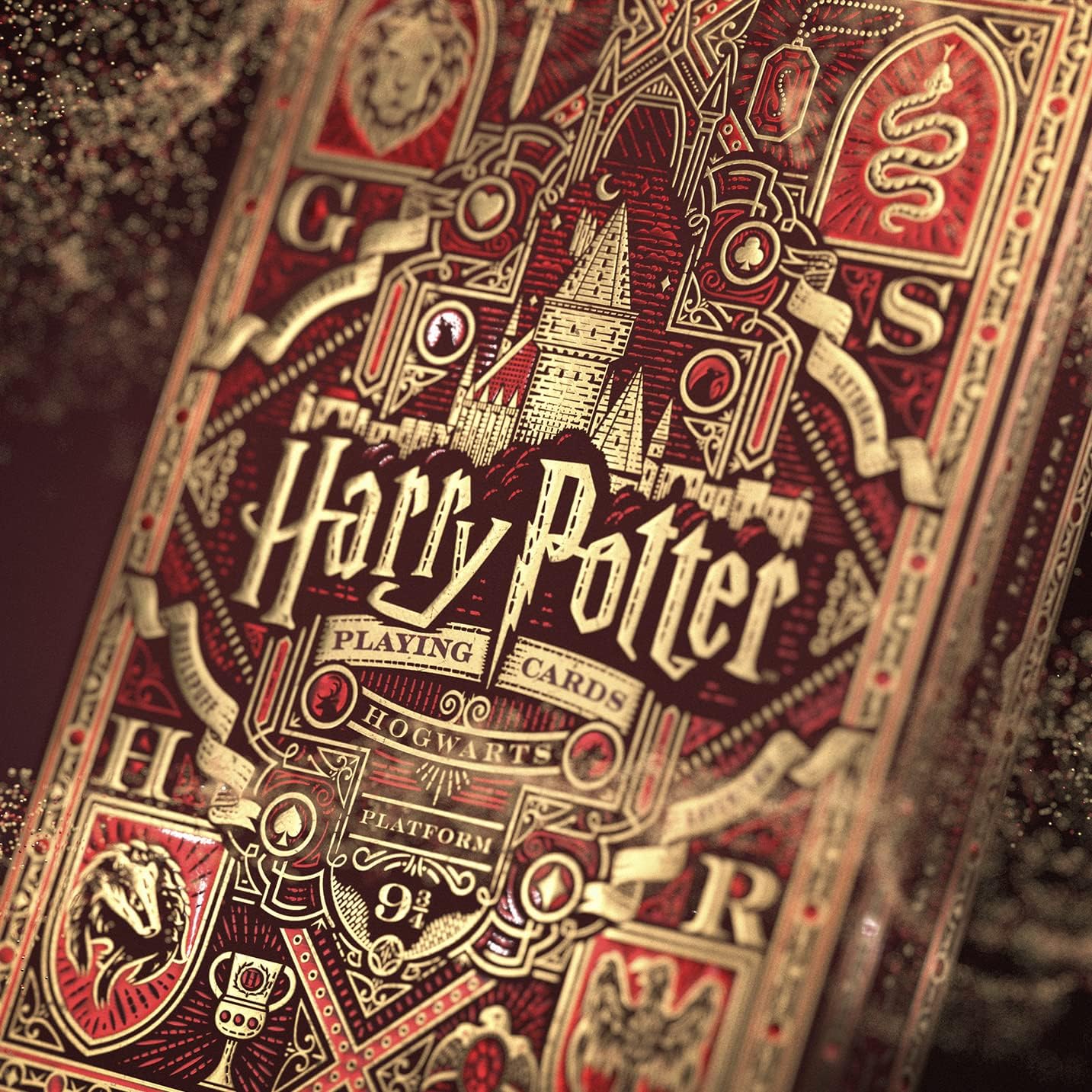 Harry Potter playing cards with intricate design and Hogwarts castle illustration.
