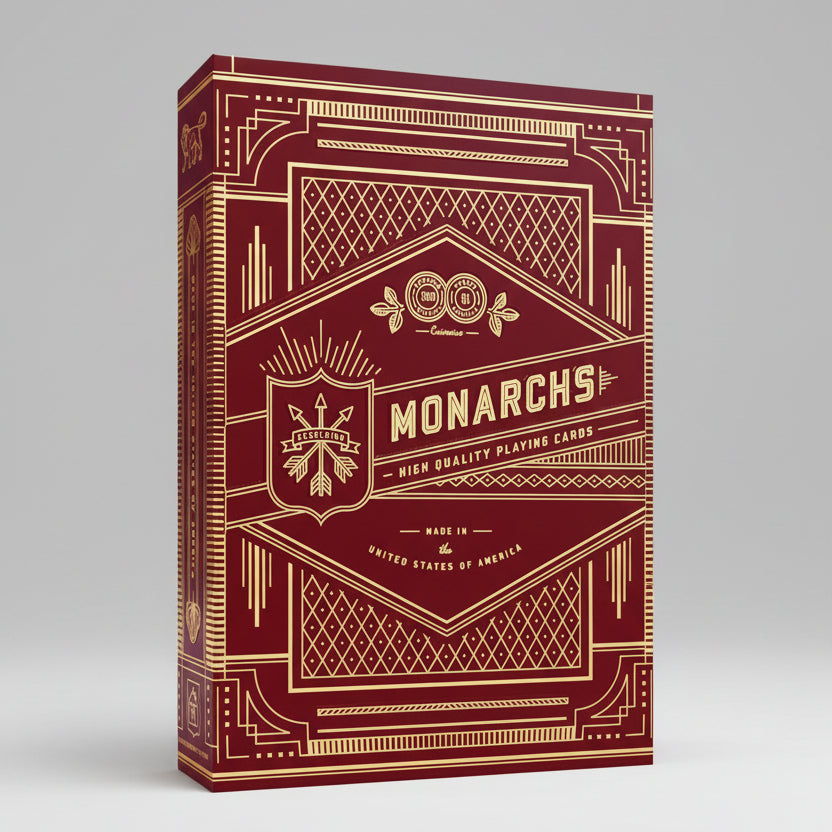 Red and gold playing card box with 'Monarchs' branding