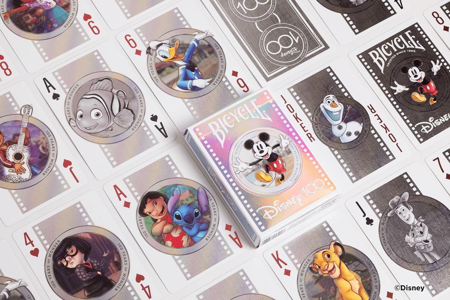 Disney-themed playing cards with character illustrations on a white background