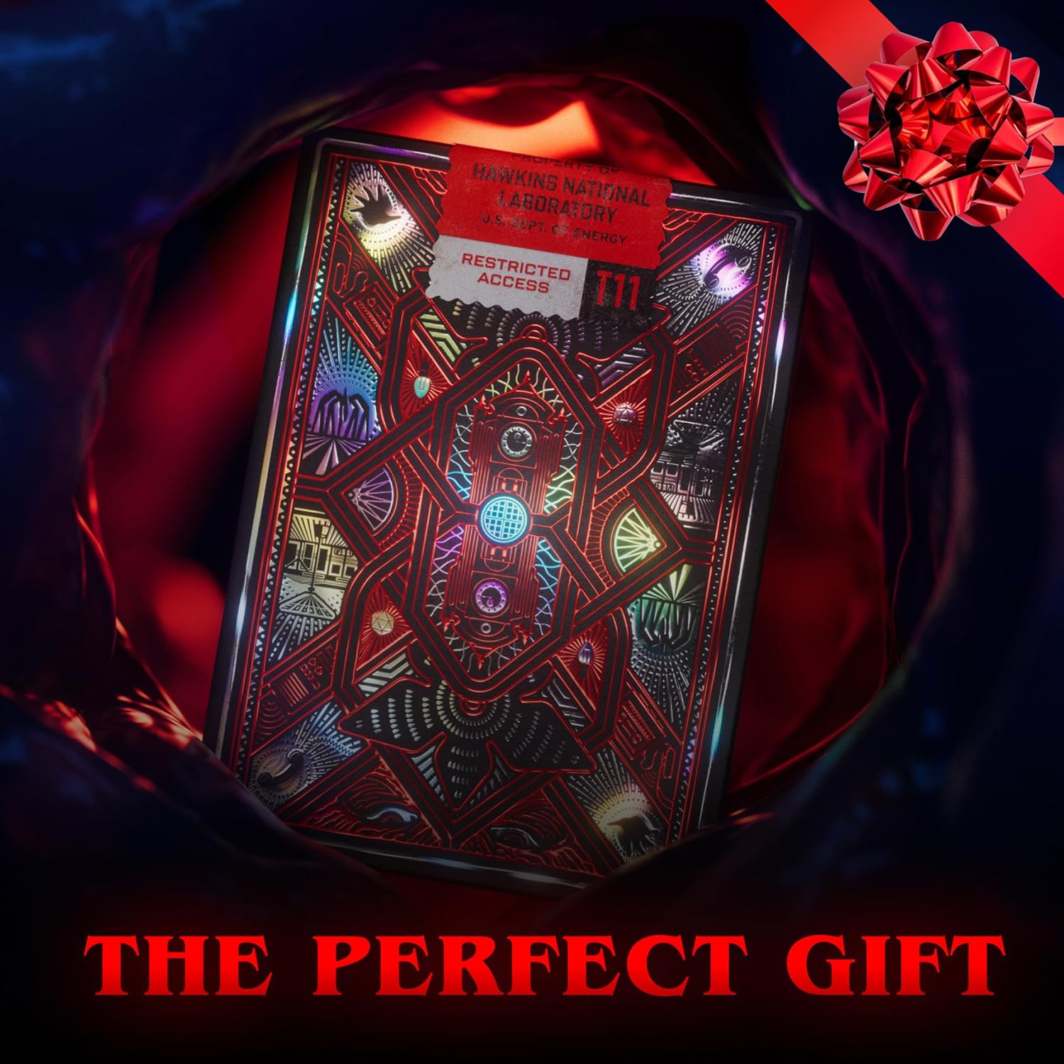 Decorative box with intricate design and red ribbon, labeled 'The Perfect Gift'.