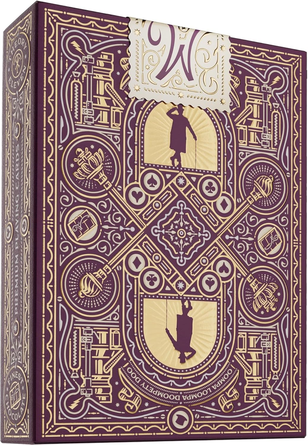 Decorative purple and gold book with intricate designs on a white background