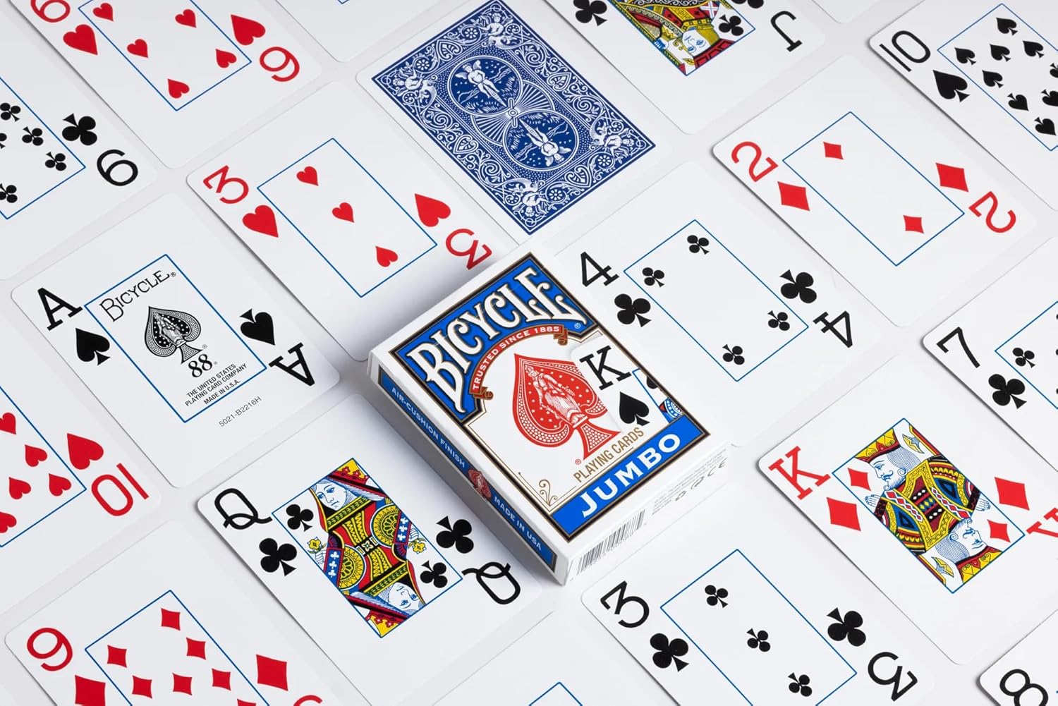 Bicycle Jumbo index playing cards with various card faces displayed on a white background.