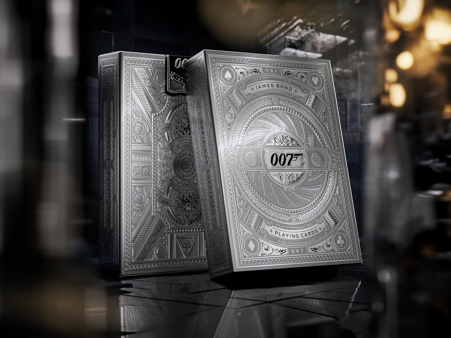 007 playing cards with metallic finish on a dark background