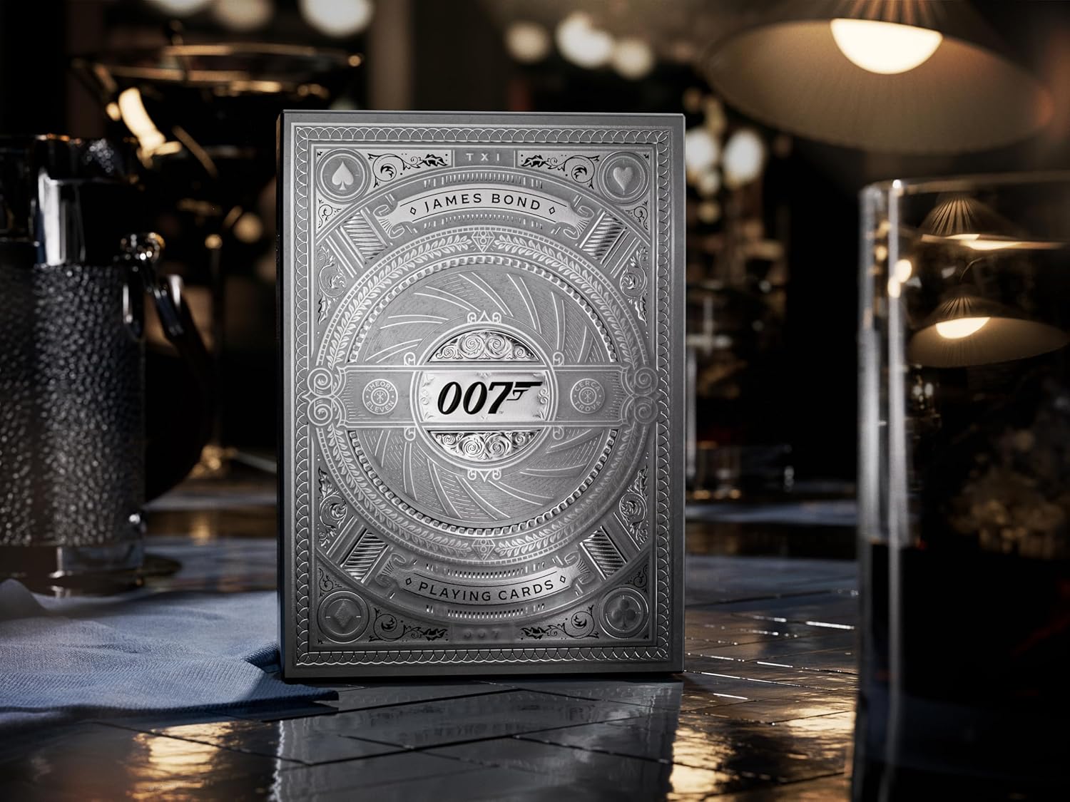 007 playing cards packaging on a table with a blurred bar background