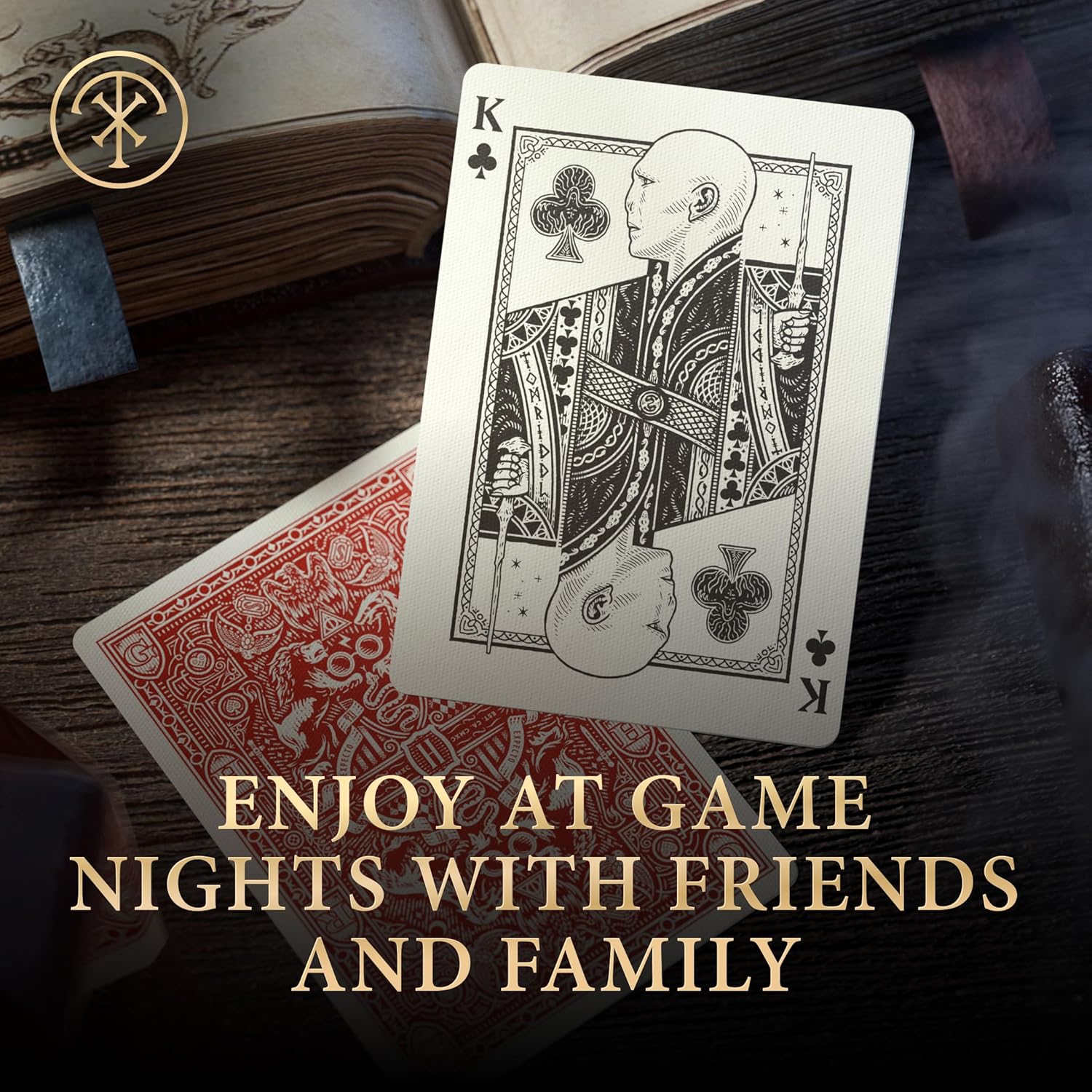 Playing card with King of Clubs design on a wooden surface with text 'Enjoy at game nights with friends and family'.