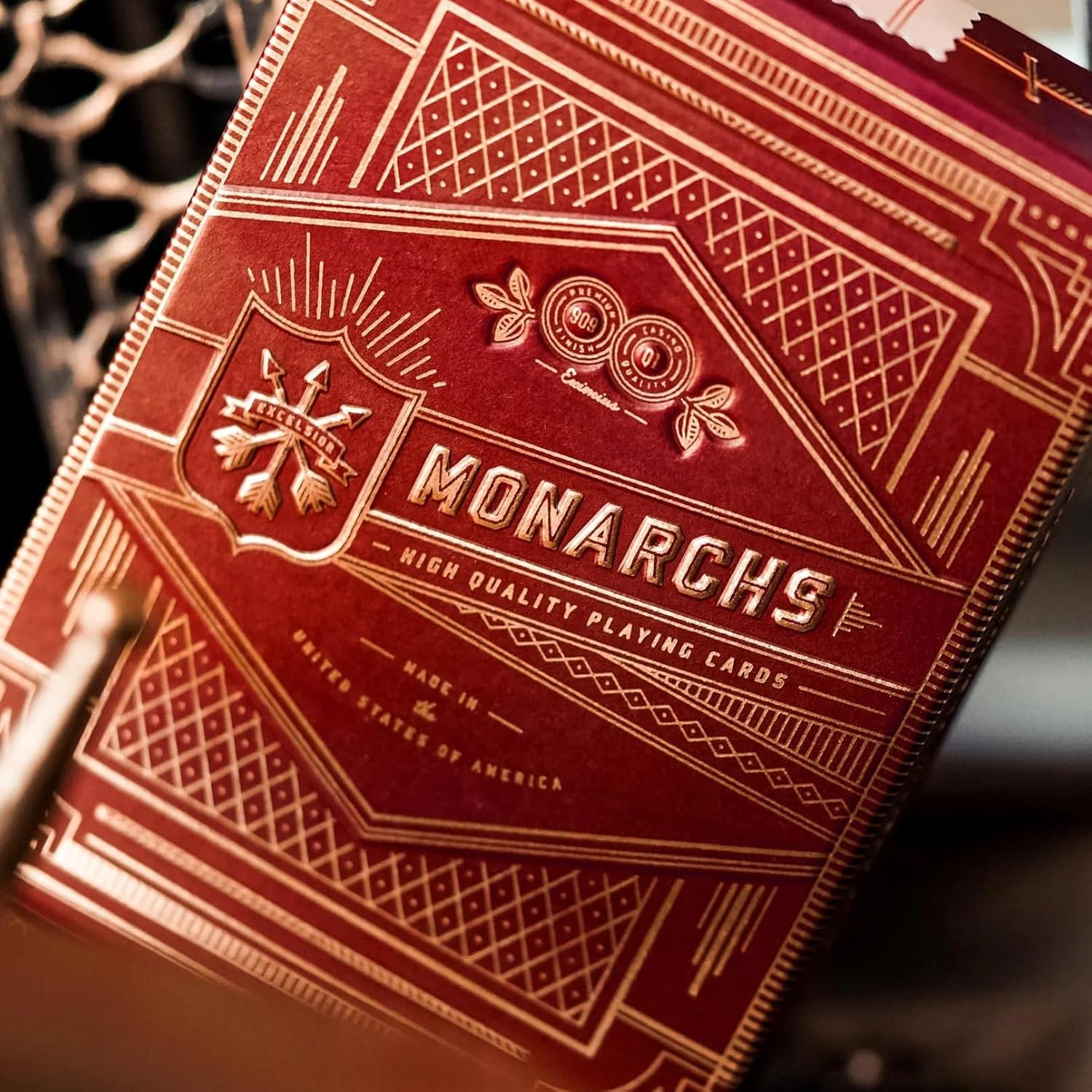 Red and gold Monarchs playing card box with intricate designs