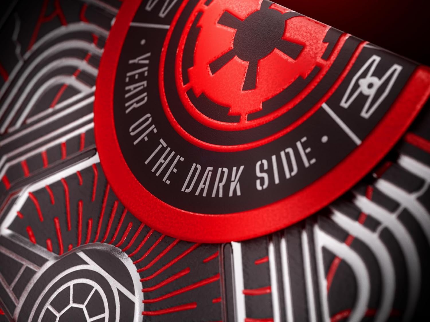 Close-up of a card with a red and black design featuring text and symbols, likely related to a themed product or event.