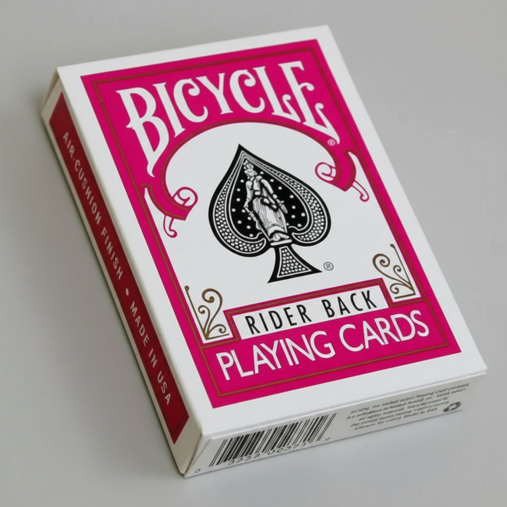 Bicycle Fuchsia playing cards packaging on a wooden surface