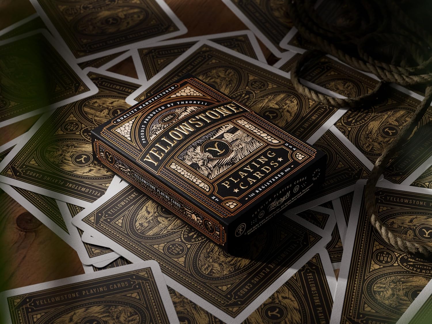 Yellowstone playing cards with decorative box on a pile of cards