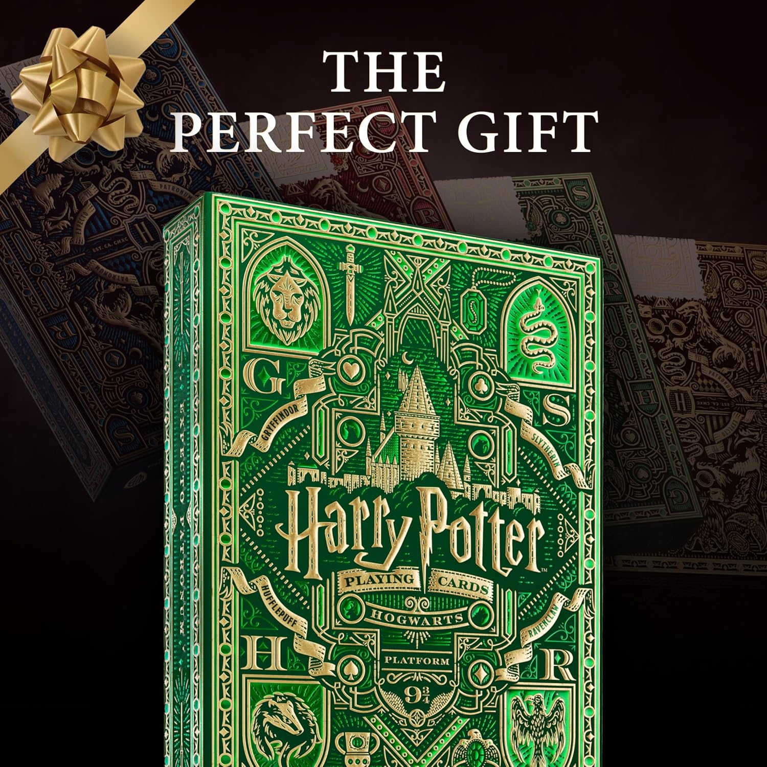 Green and gold Harry Potter playing card box with decorative elements on a dark background